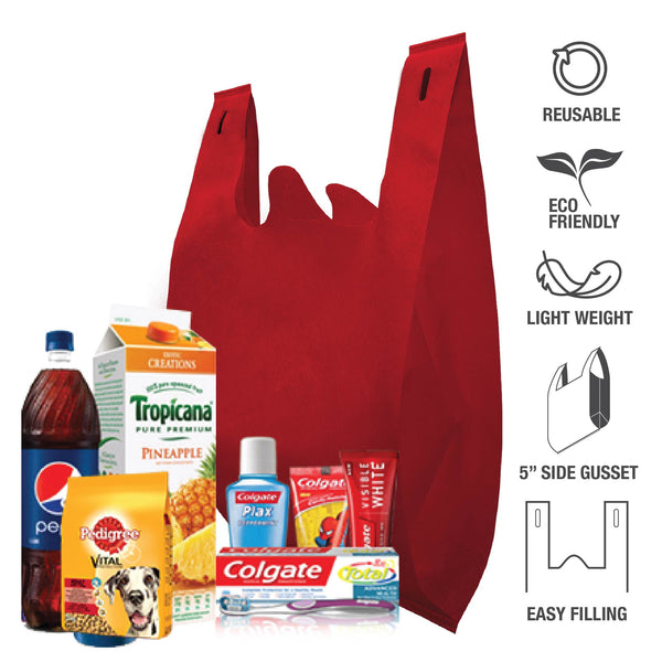 A red reusable shopping bag filled with multiple grocery items