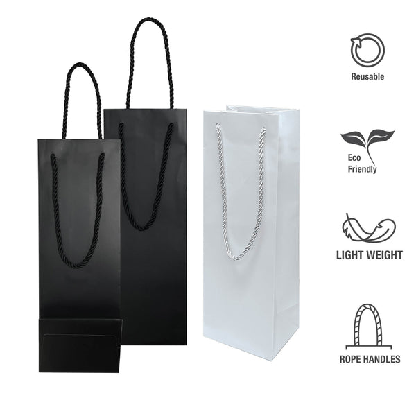 three paper bags with handles, one in white and two in black with feature icons