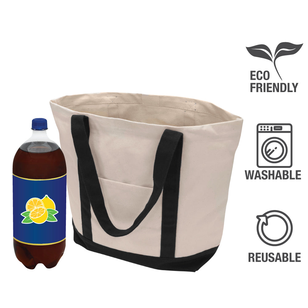 A plain tote bag with black handles near a bottle of lemon tea