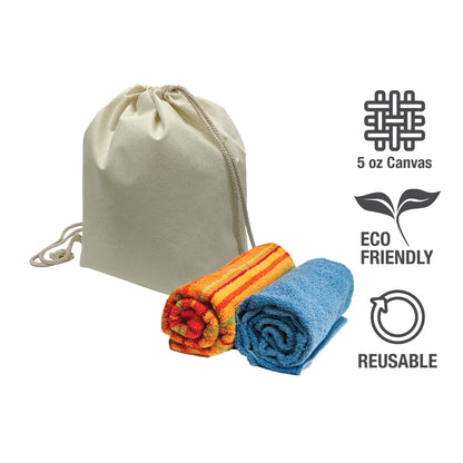Two towels neatly folded near a canvas drawstring bag