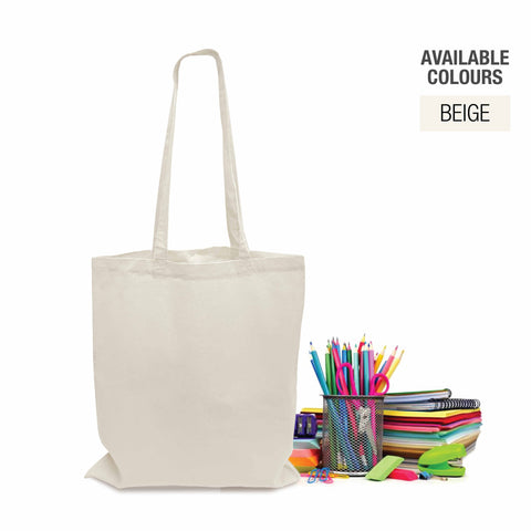 A white canvas bag with handles containing various stationary like notebooks and pencils