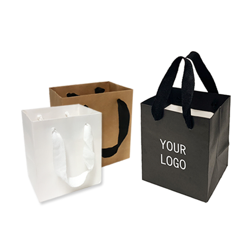 Three paper bags in natural, white and black with the words "Your Logo" 