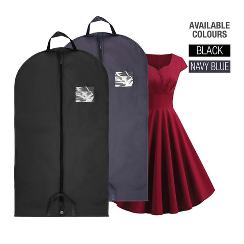 A red dress next to two garment bags