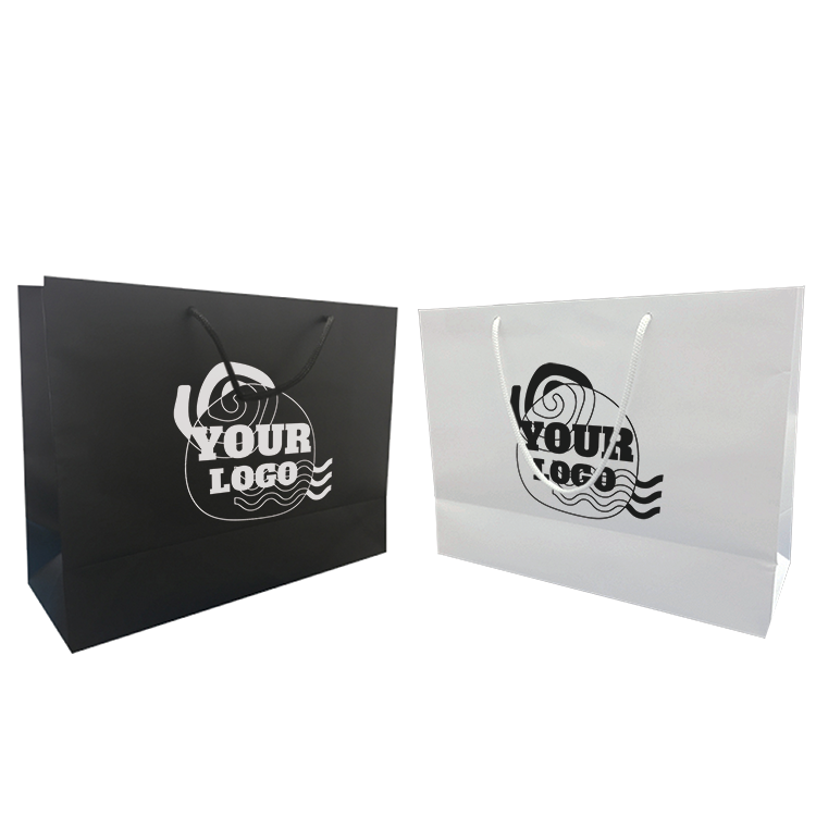 Two black and white shopping bags with a logo on them