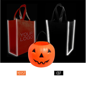 Two customized Halloween shopping bags in red and black with spooky designs