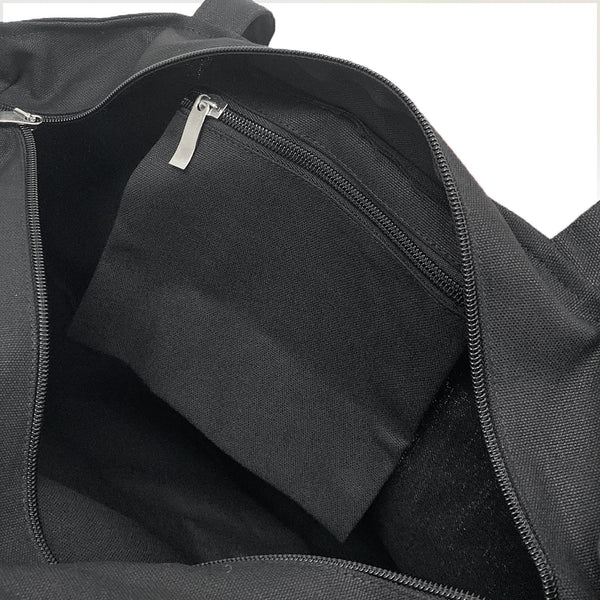 Close-up of a black canvas bag inside pocket