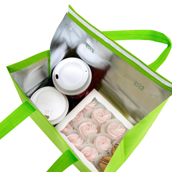A green thermal bag filled with coffee and various items